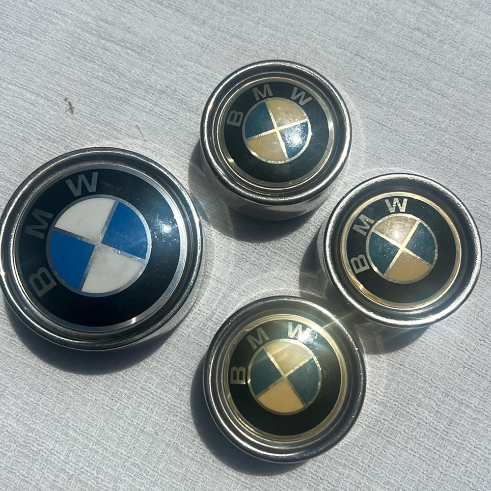 Vintage BMW Metal Wheel Center hub cap set for 3 and a bigger one.